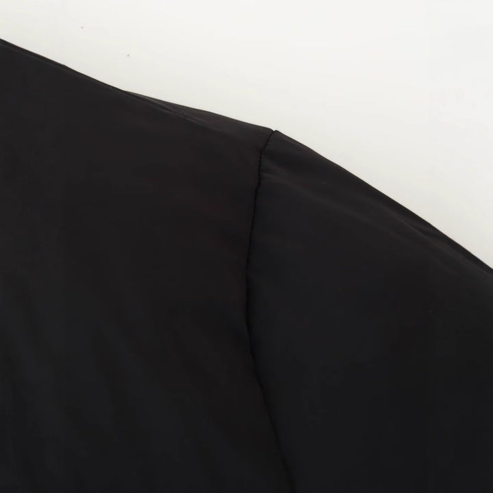 Dame quiltad cropped jacka med hög krage och praktiska snörningar Mirla-Eva Jonsson