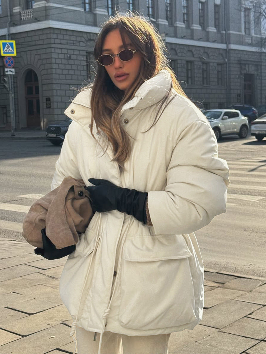 Dame quiltad vinterjacka med hög krage och praktisk midjesnörning Mirla-Eva Jonsson