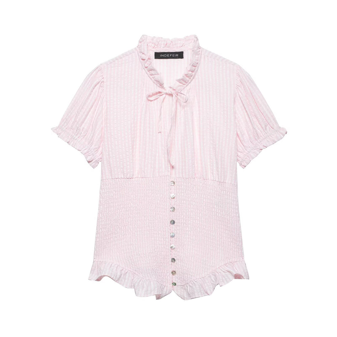 Dame ruffled blouse with slotted collar and button details Mirla-Eva Jonsson