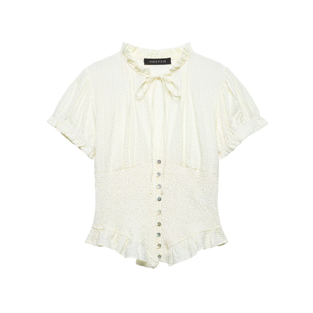 Dame ruffled blouse with slotted collar and button details Mirla-Eva Jonsson