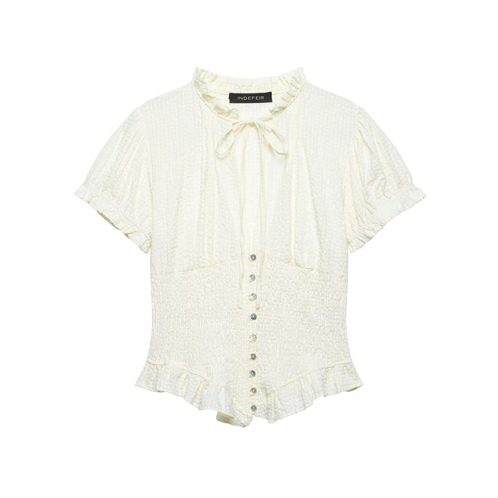 Dame ruffled blouse with slotted collar and button details Mirla-Eva Jonsson