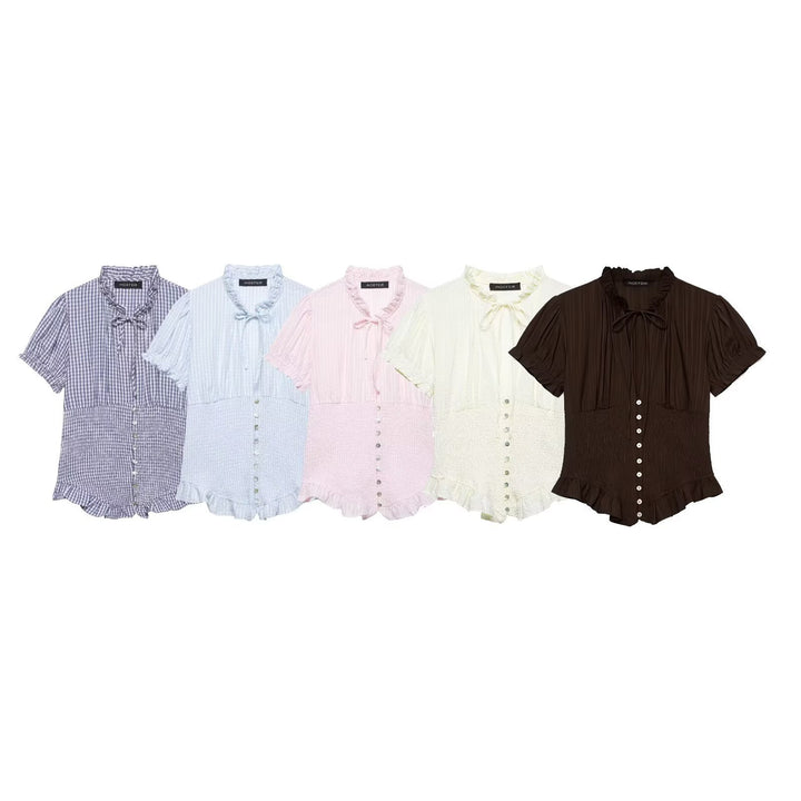 Dame ruffled blouse with slotted collar and button details Mirla-Eva Jonsson