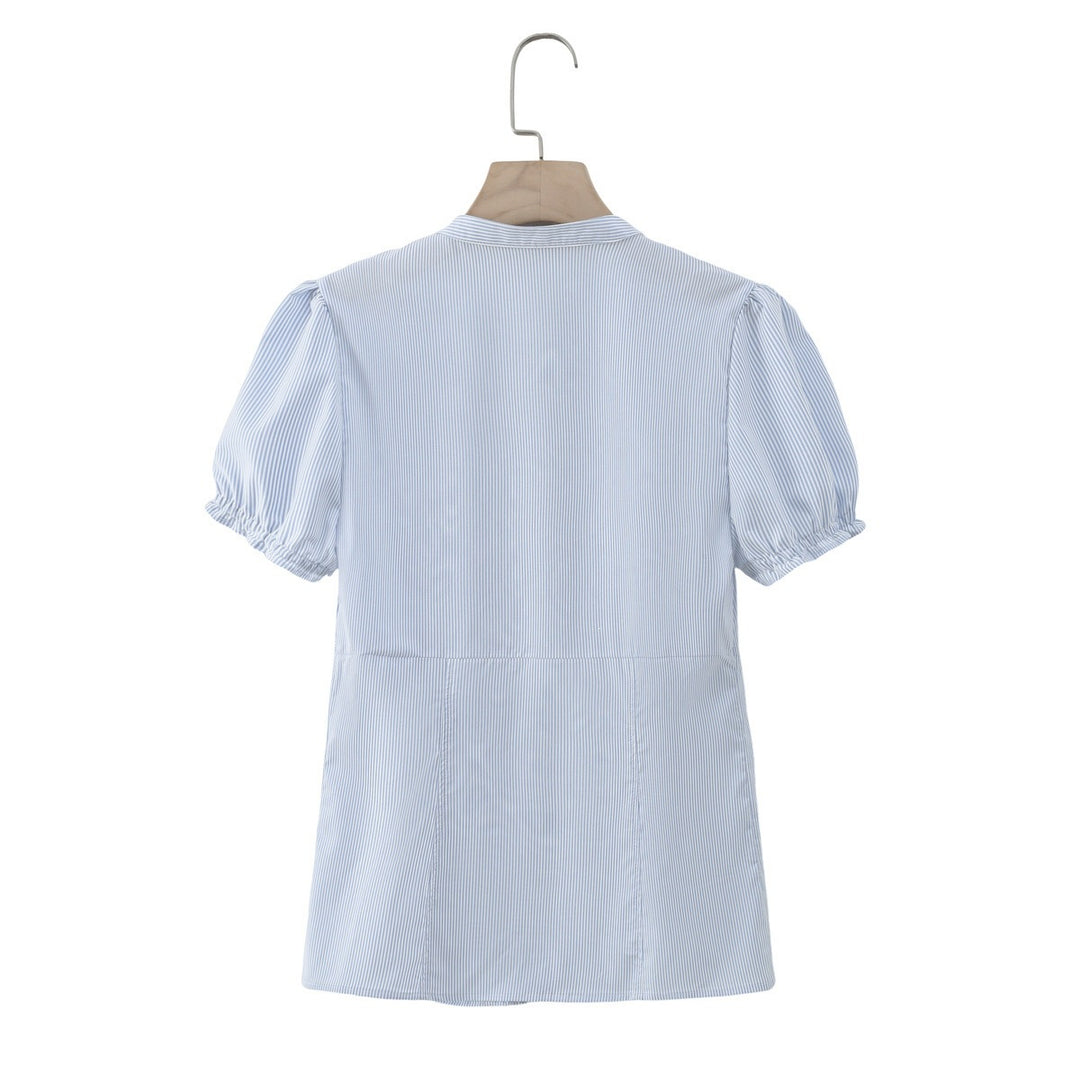 Dame ruffled shirt with elegant V-neck and fitted silhouette Mirla-Eva Jonsson