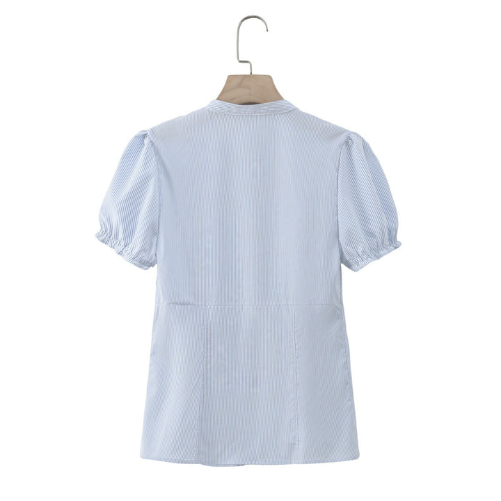 Dame ruffled shirt with elegant V-neck and fitted silhouette Mirla-Eva Jonsson