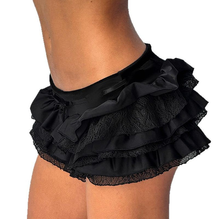 Dame ruffled skirt with elegant satin finish and lace trim Mirla-Eva Jonsson