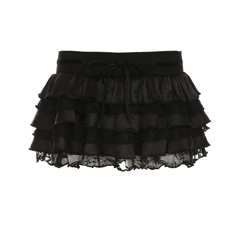 Dame ruffled skirt with elegant satin finish and lace trim Mirla-Eva Jonsson