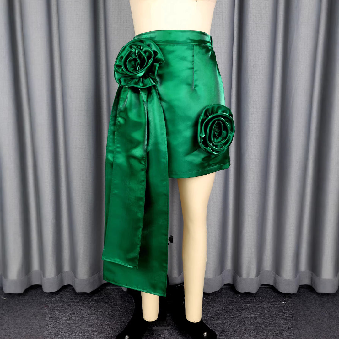 Dame satin skirt with floral ruffle design and fitted bow Mirla-Eva Jonsson
