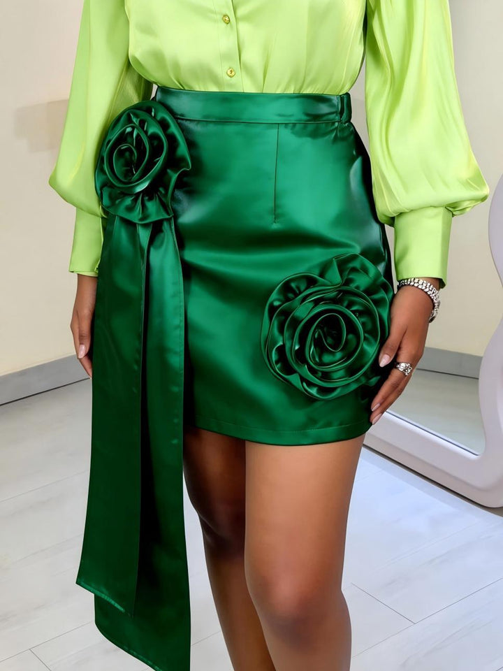Dame satin skirt with floral ruffle design and fitted bow Mirla-Eva Jonsson
