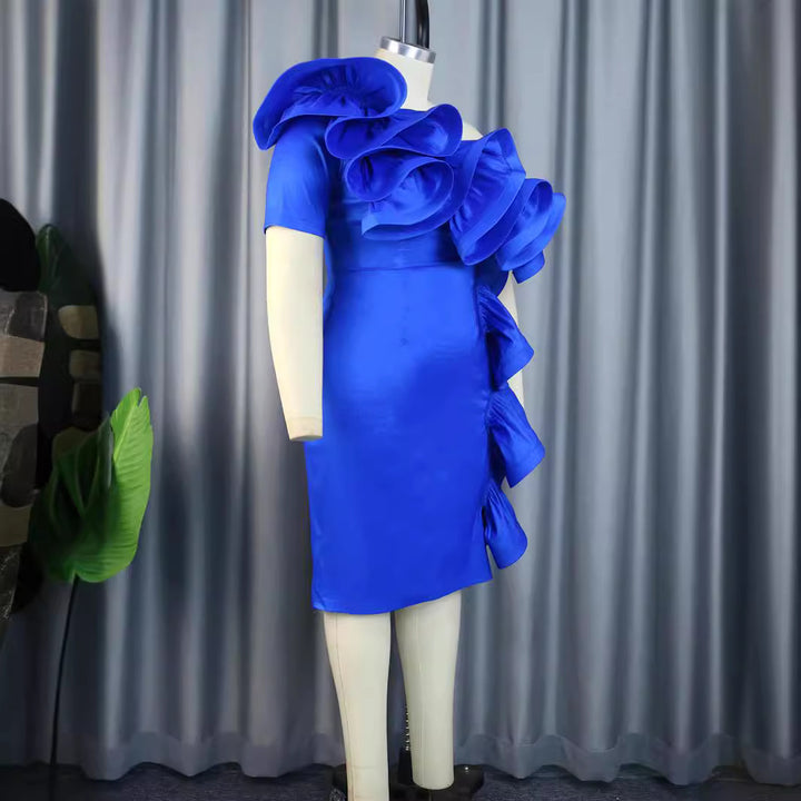 Dame sheath dress with voluminous ruffles and asymmetric design Mirla-Eva Jonsson