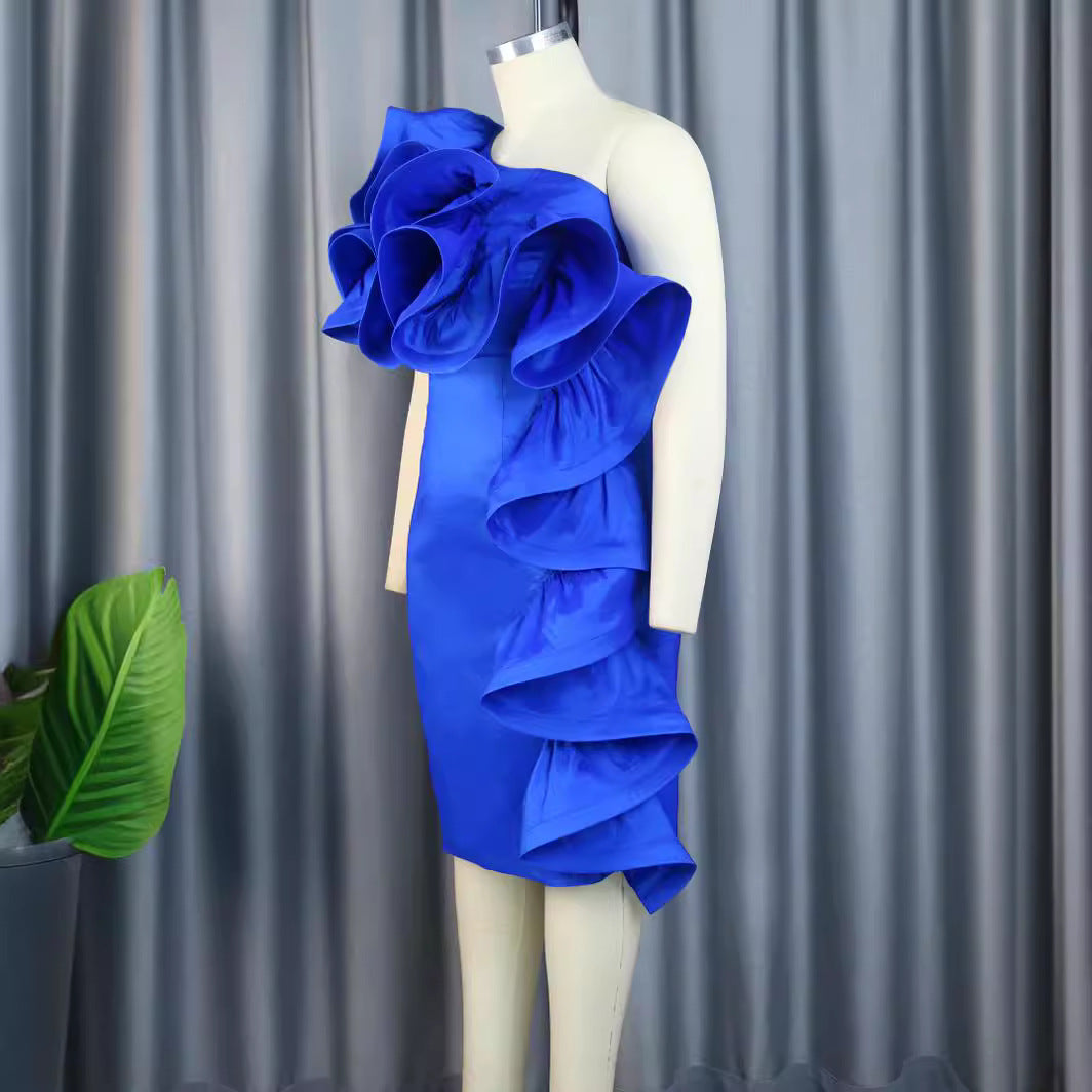 Dame sheath dress with voluminous ruffles and asymmetric design Mirla-Eva Jonsson