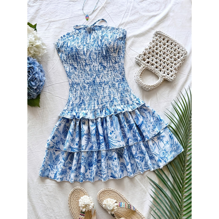Dame sommarklänning med volanger och blommönster Mirla-Eva Jonsson