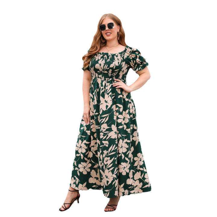 Dame sommarmaxiklänning med romantiskt blommönster och puffärmar Mirla-Eva Jonsson
