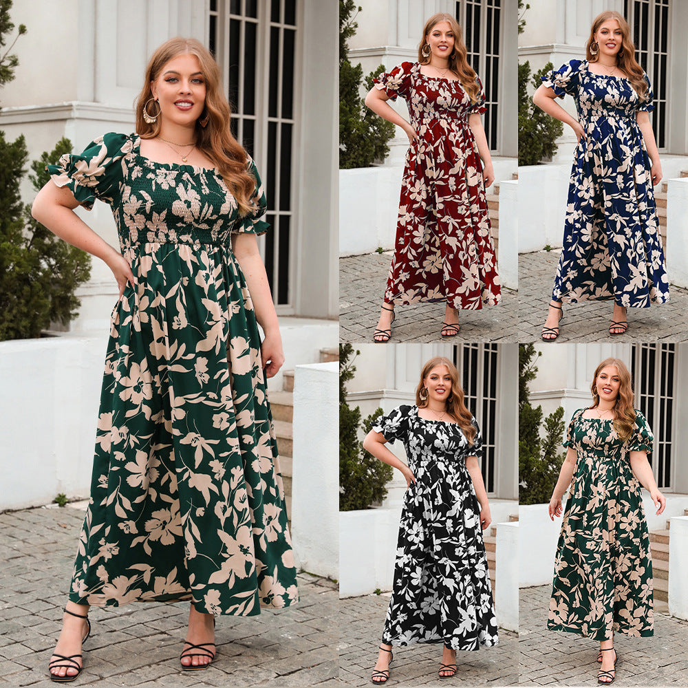Dame sommarmaxiklänning med romantiskt blommönster och puffärmar Mirla-Eva Jonsson