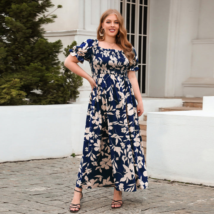 Dame sommarmaxiklänning med romantiskt blommönster och puffärmar Mirla-Eva Jonsson