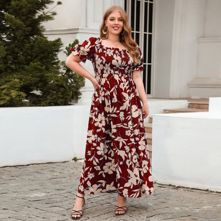 Dame sommarmaxiklänning med romantiskt blommönster och puffärmar Mirla-Eva Jonsson