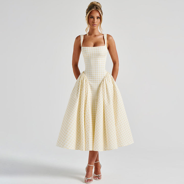 Dame sommarmaxiklänning med rutig design och sidofållselement Mirla-Eva Jonsson