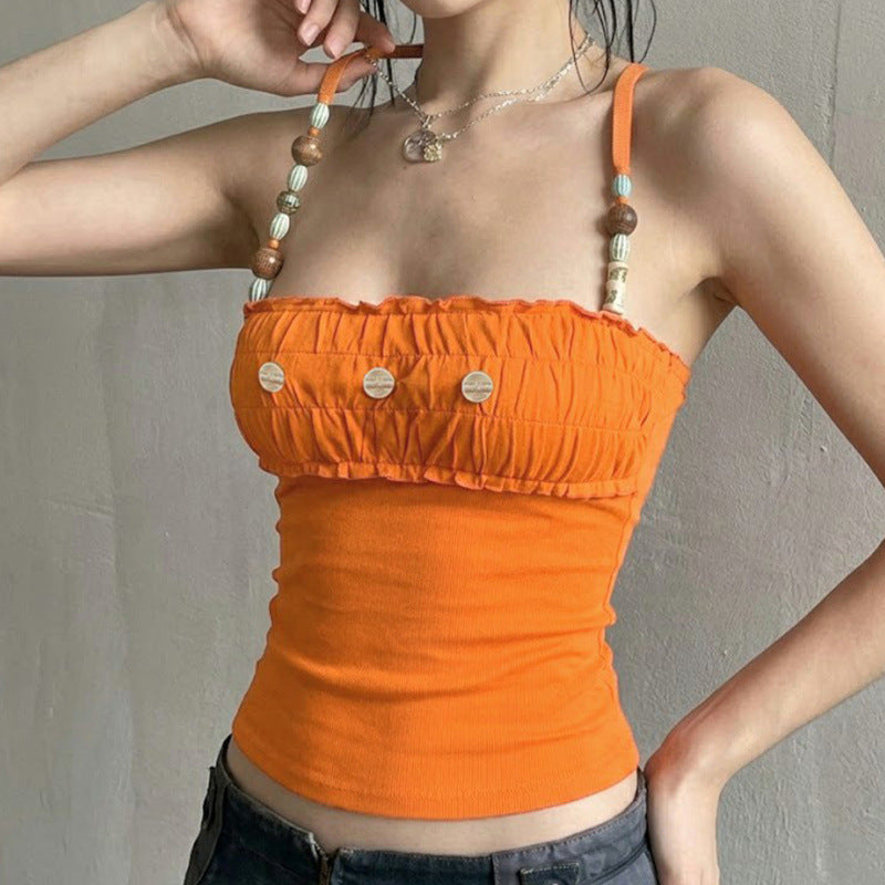 Dame spets-crop-top med dekorativa volanger och knapppdetaljer Mirla-Eva Jonsson