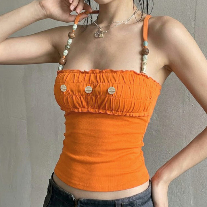 Dame spets-crop-top med dekorativa volanger och knapppdetaljer Mirla-Eva Jonsson