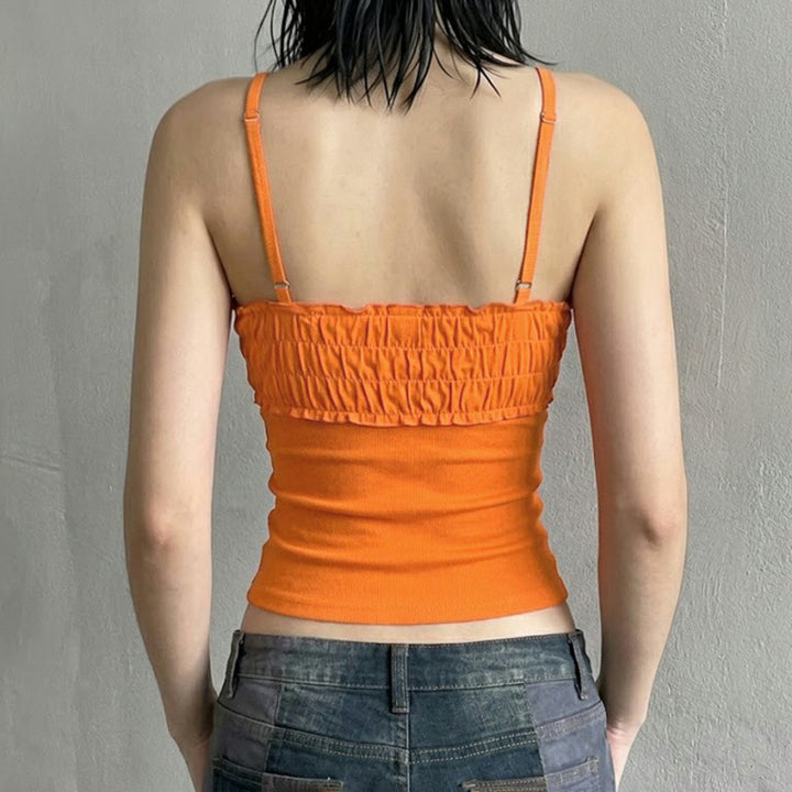 Dame spets-crop-top med dekorativa volanger och knapppdetaljer Mirla-Eva Jonsson