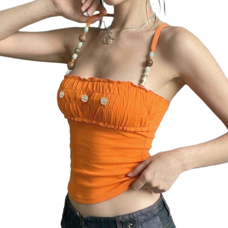 Dame spets-crop-top med dekorativa volanger och knapppdetaljer Mirla-Eva Jonsson