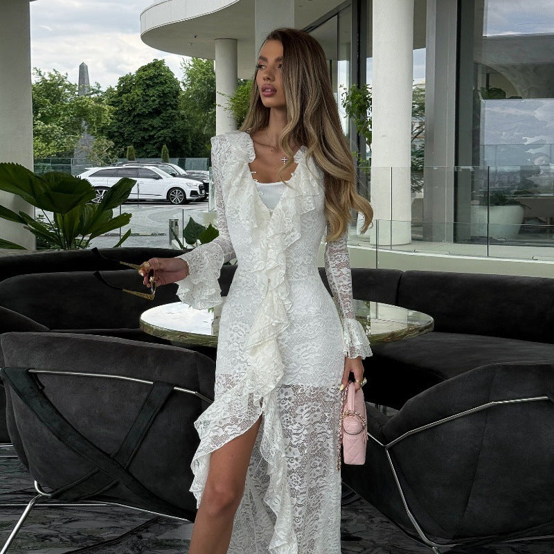 Dame spets maxi klänning med voluminösa ruffle detaljer och sidoficka Mirla-Eva Jonsson