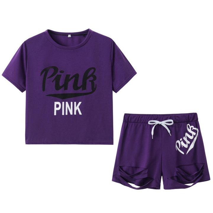 Dame sportig t-shirt och shorts set med löst passform och kontrasterande tryck Mirla-Eva Jonsson