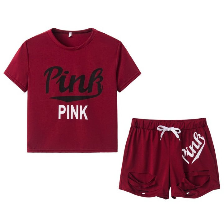 Dame sportig t-shirt och shorts set med löst passform och kontrasterande tryck Mirla-Eva Jonsson
