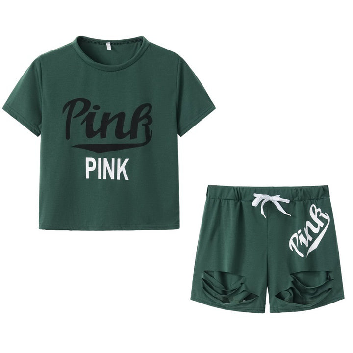 Dame sportig t-shirt och shorts set med löst passform och kontrasterande tryck Mirla-Eva Jonsson