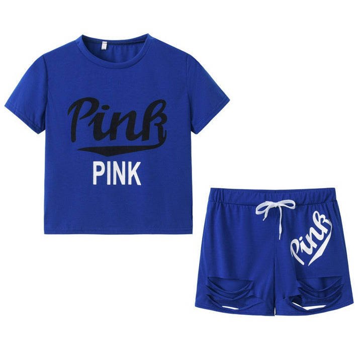 Dame sportig t-shirt och shorts set med löst passform och kontrasterande tryck Mirla-Eva Jonsson