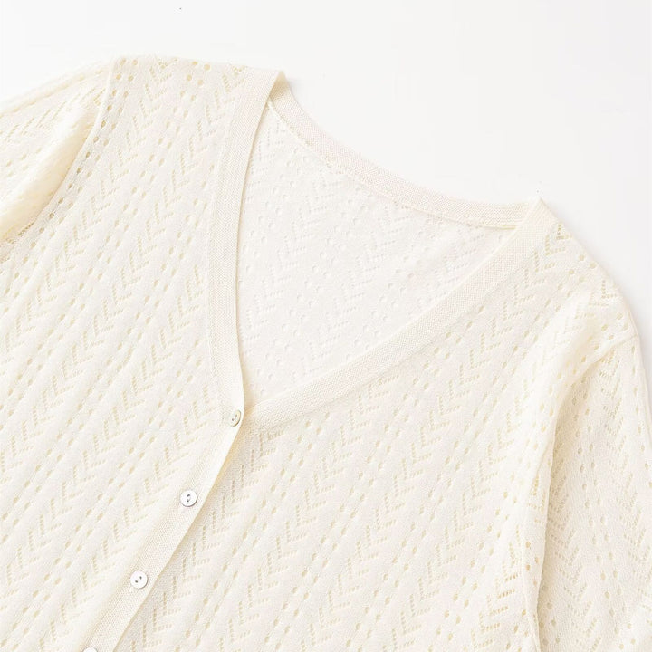 Dame stickad crop-top med V-hals och knapplist Mirla-Eva Jonsson