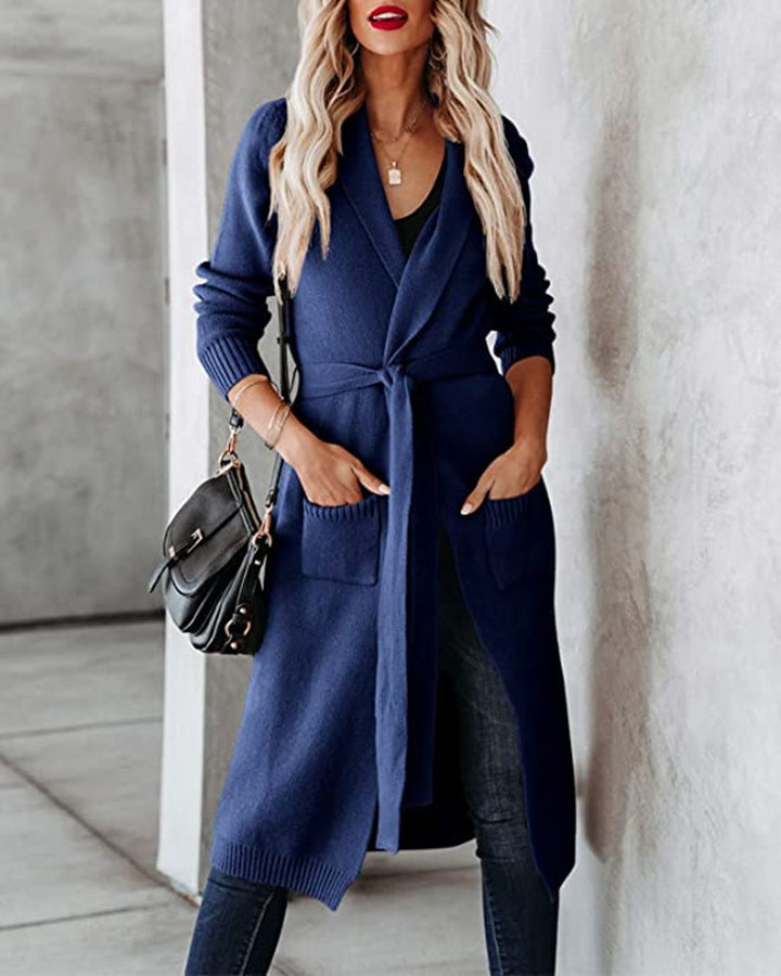Dame stickad kappa med öppen design och praktiska fickor Eva Jonsson-Eva Jonsson