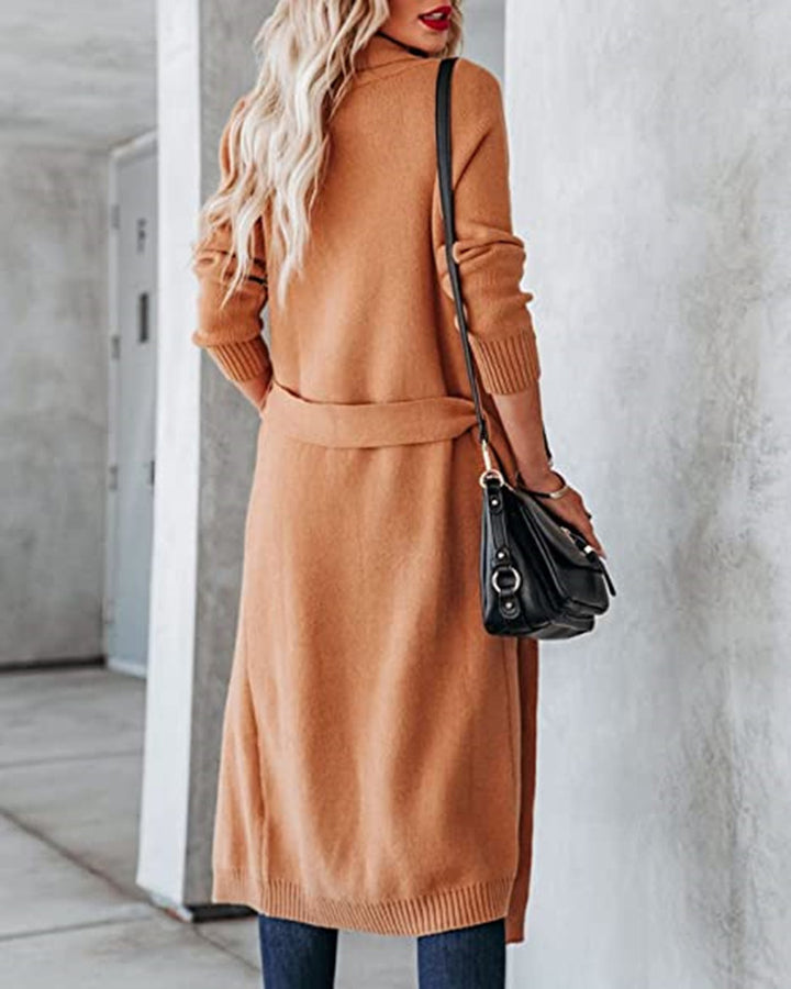 Dame stickad kappa med öppen design och praktiska fickor Eva Jonsson-Eva Jonsson