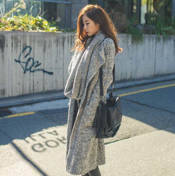 Dame stickad kappa med oversized passform och avslappnade fickor Eva Jonsson-Eva Jonsson