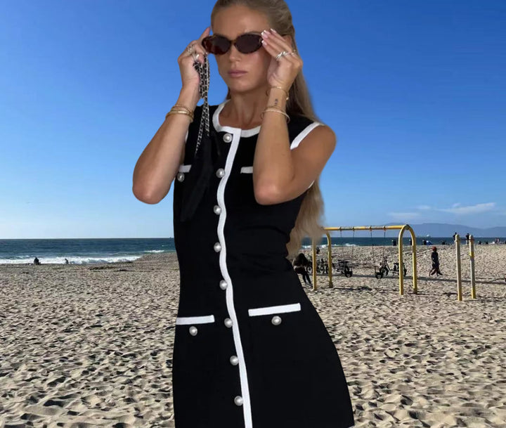 Dame stickad maxiklänning med knappslå och sidssprund Mirla-Eva Jonsson