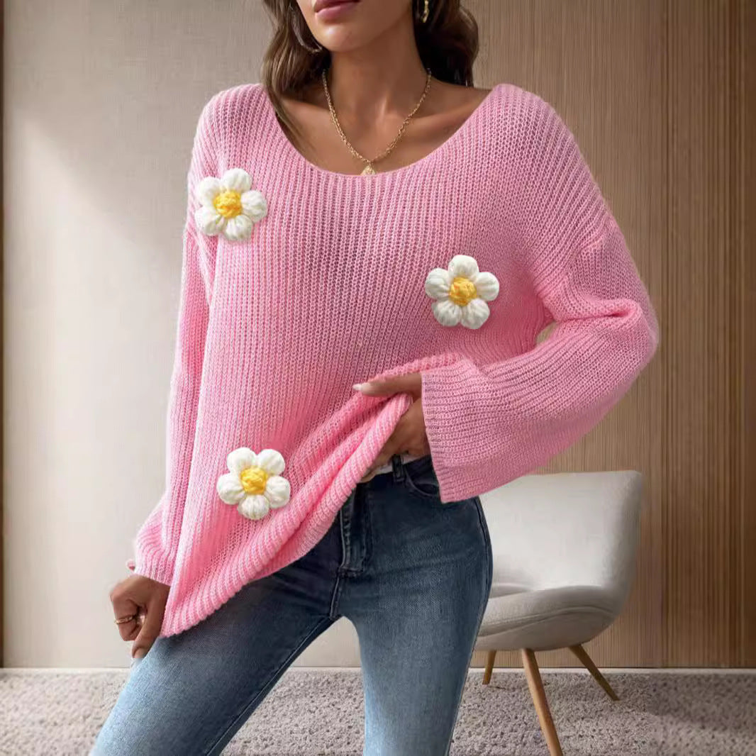 Dame stickad tröja med lekfulla blomapplikationer Mirla-Eva Jonsson