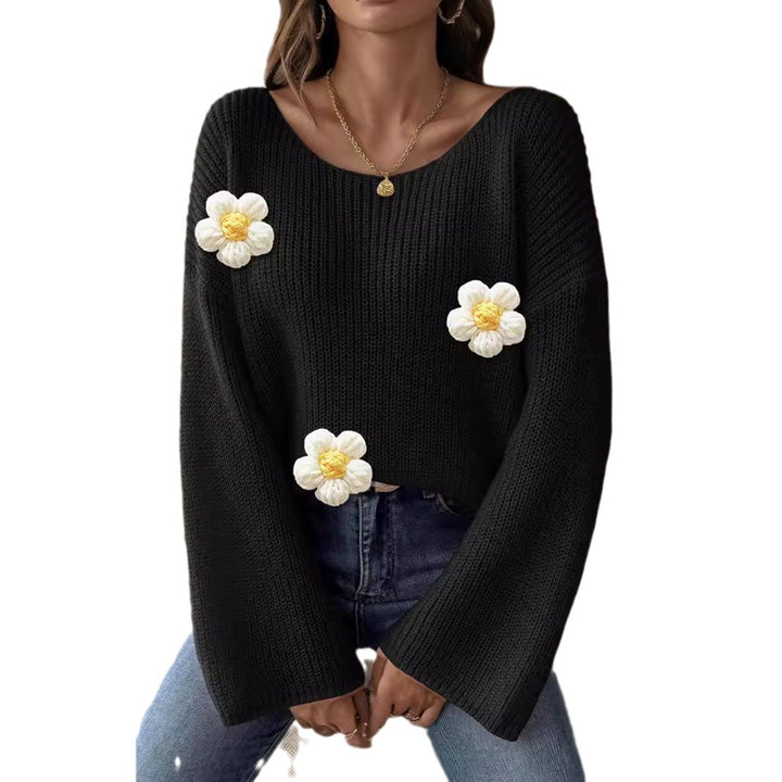 Dame stickad tröja med lekfulla blomapplikationer Mirla-Eva Jonsson
