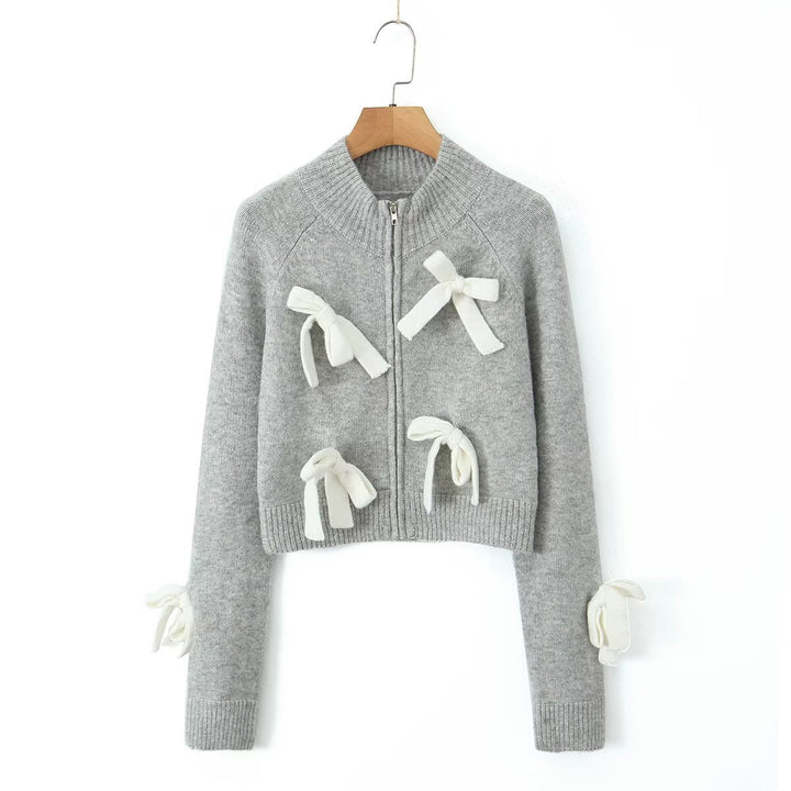 Dame stilren cropped stickad jacka med volangdetaljer Mirla-Eva Jonsson
