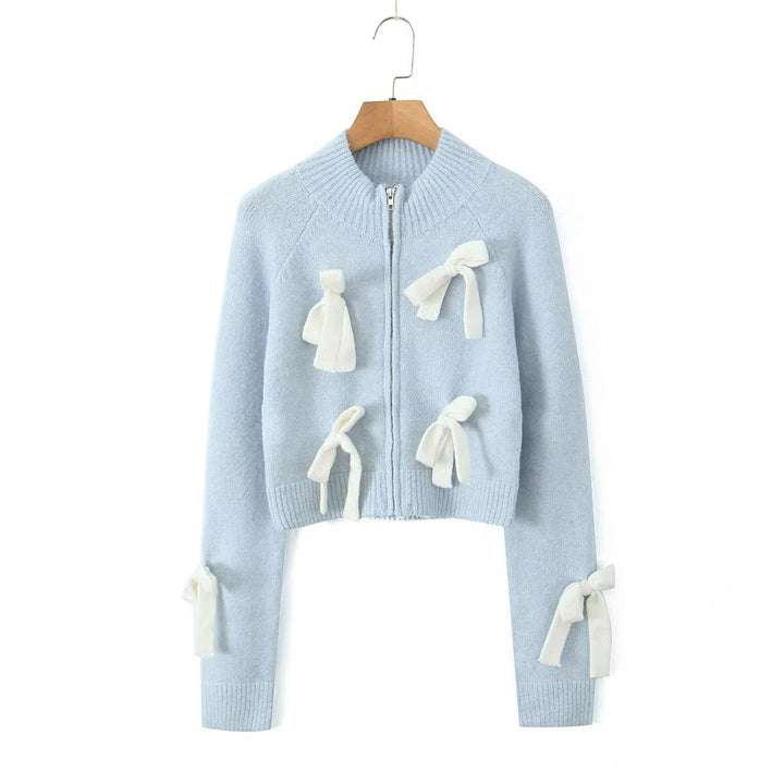 Dame stilren cropped stickad jacka med volangdetaljer Mirla-Eva Jonsson