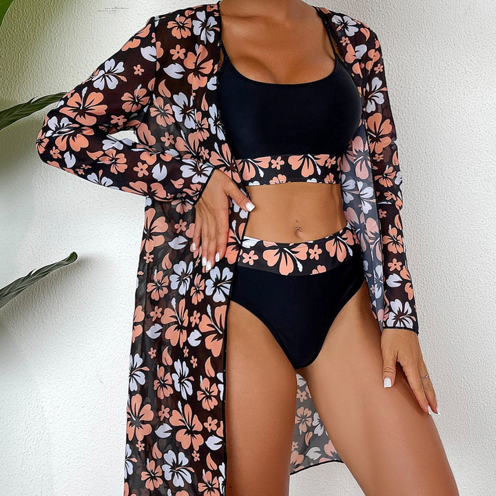 Dame strandcover-up med blommigt mönster och elegant transparens Mirla-Eva Jonsson