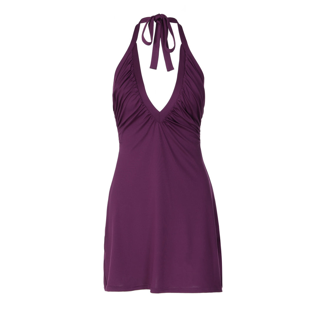 Dame strandkjole med alternativt halter-design og flatterende drapering Mirla-Eva Jonsson