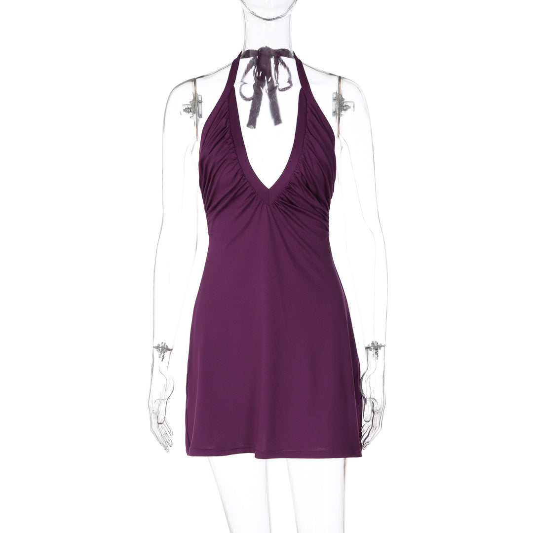 Dame strandkjole med alternativt halter-design og flatterende drapering Mirla-Eva Jonsson