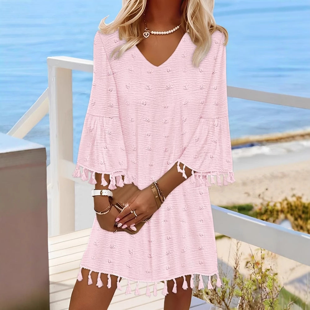 Dame strandklänning med elegant V-ringning och dekorativa fransar Eva Jonsson-Eva Jonsson