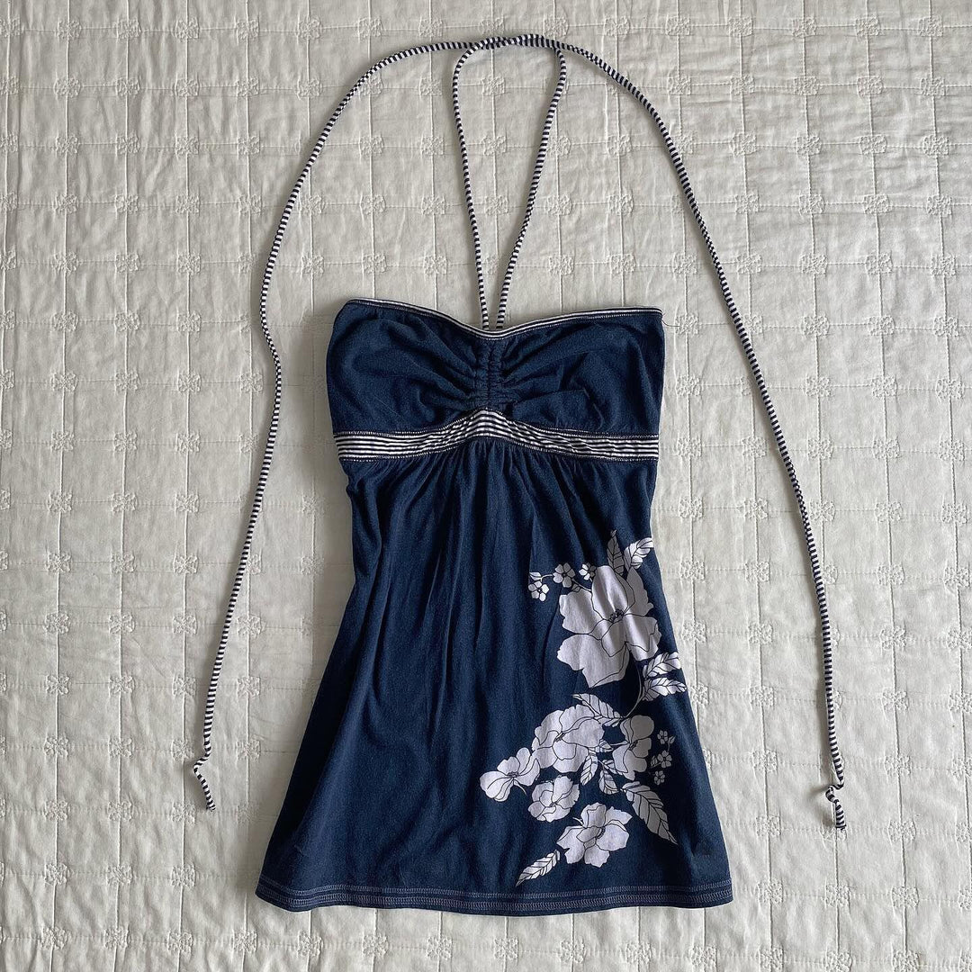 Dame strandtop med blommönster och off-shoulder design Mirla-Eva Jonsson