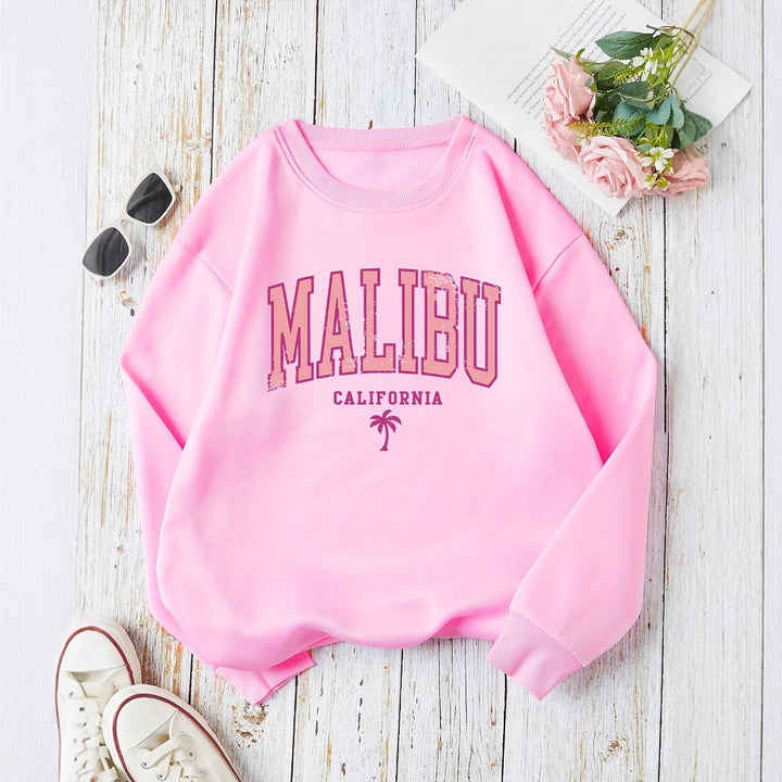 Dame sweatshirt med livlig Malibu-tryck och avslappnad passform Mirla-Eva Jonsson