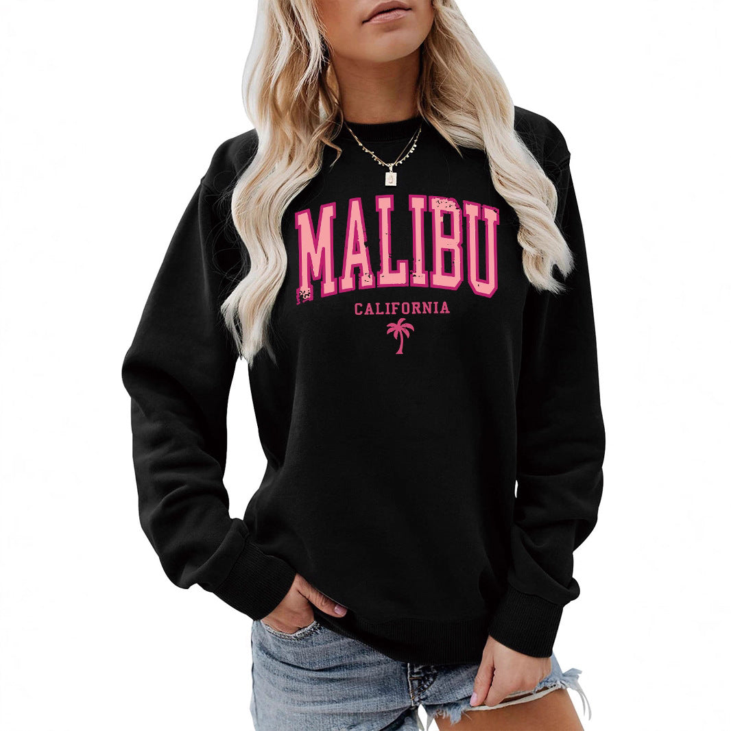 Dame sweatshirt med livlig Malibu-tryck och avslappnad passform Mirla-Eva Jonsson