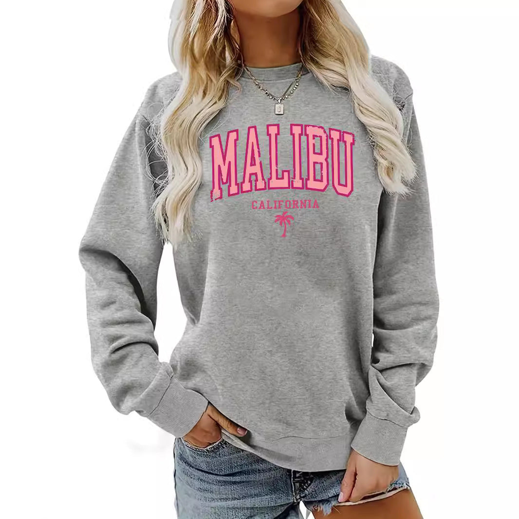 Dame sweatshirt med livlig Malibu-tryck och avslappnad passform Mirla-Eva Jonsson
