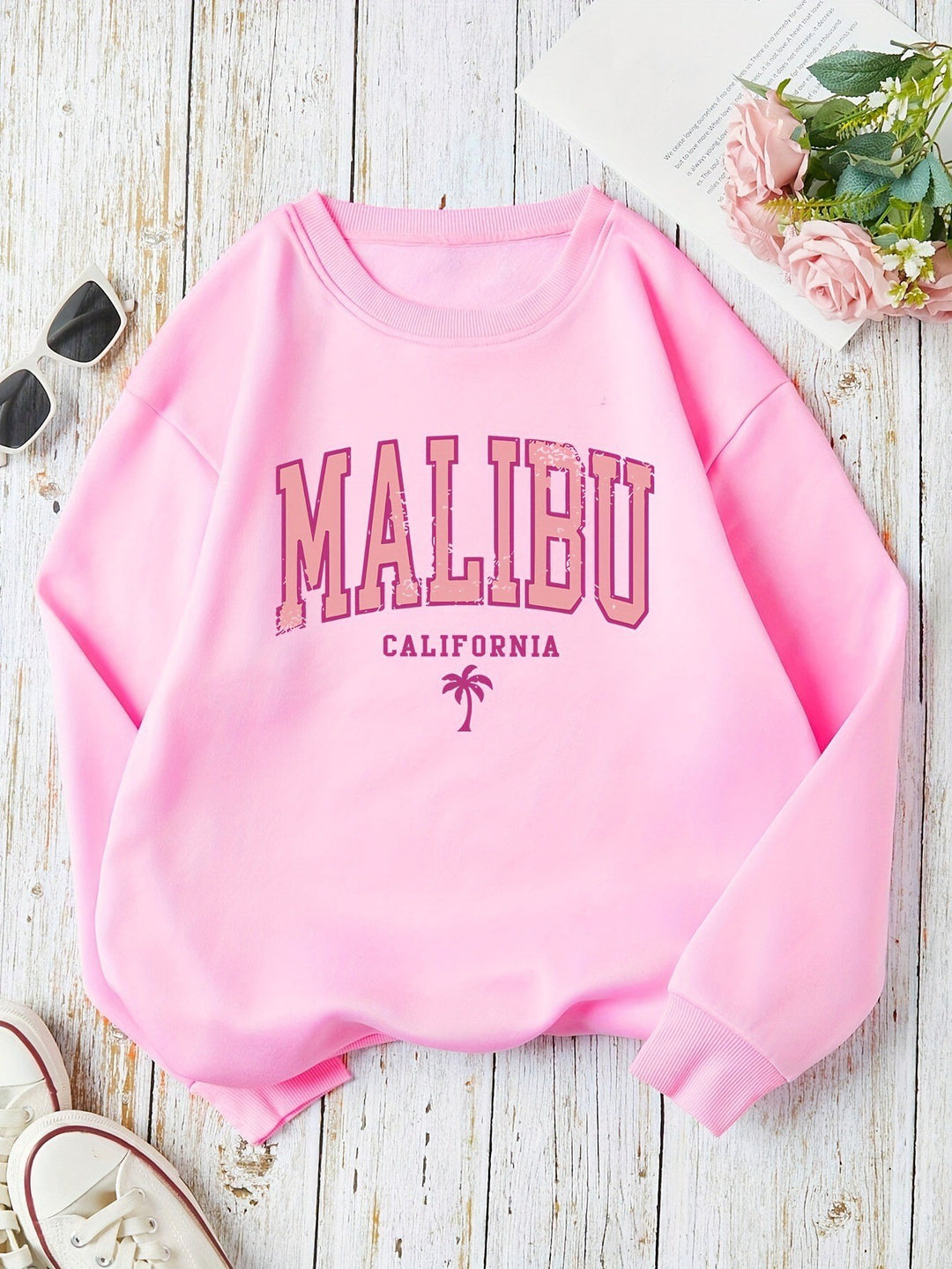 Dame sweatshirt med livlig Malibu-tryck och avslappnad passform Mirla-Eva Jonsson