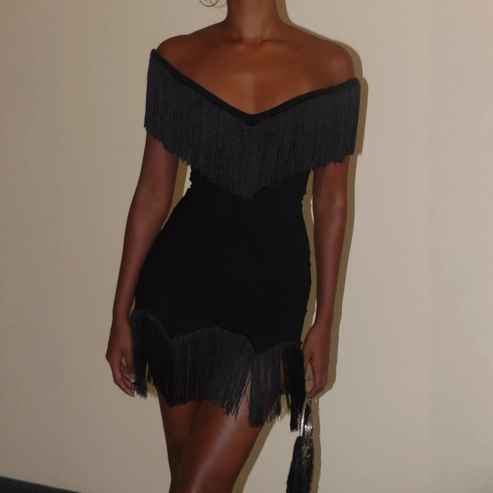 Dame topp med fransig detalj och off-shoulder-design Mirla-Eva Jonsson