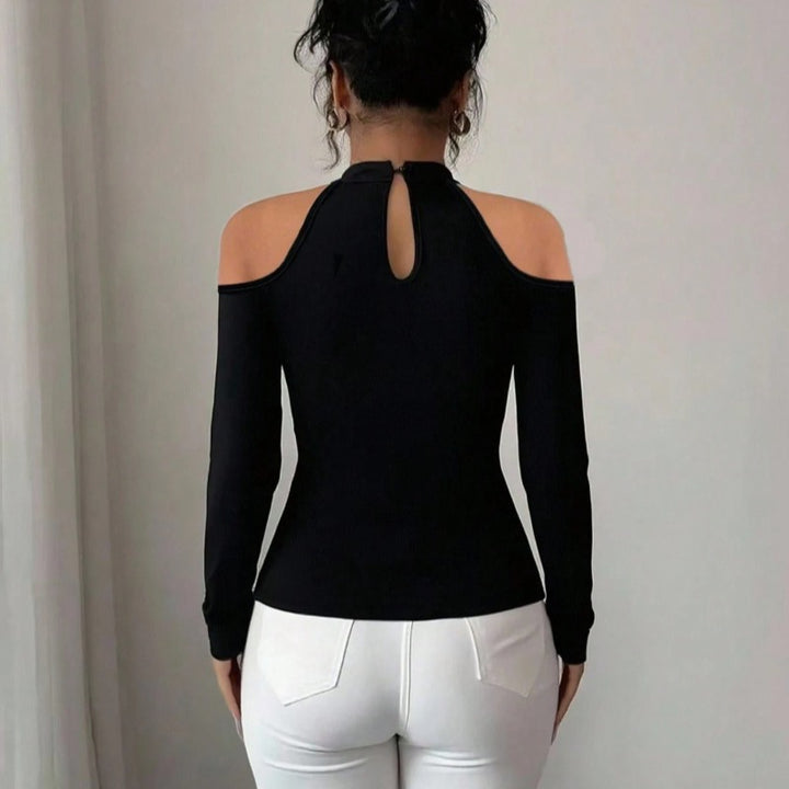 Dame topp med transparenta spetsdetaljer och elegant snitt Mirla-Eva Jonsson