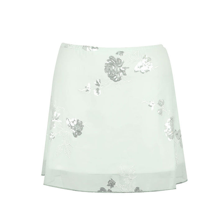 Dame transparent skirt with floral design and glittering accents Mirla-Eva Jonsson